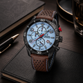 Reloj cronógrafo de hombre Festina Chrono Sport F20519/1 con esfera azul claro, caja de acero negro y correa de cuero marrón perforada con pespuntes azules.