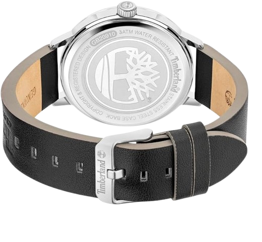  Reloj de hombre Timberland Greycourt TDWGB2091001 de acero inoxidable con esfera azul oscuro y correa de cuero negro expuesto sobre una piedra rústica. trasera