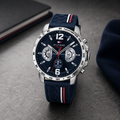  Reloj de hombre Tommy Hilfiger Decker 1791476 de acero inoxidable con esfera azul oscuro, correa de silicona azul marino y detalles de la bandera de la marca.