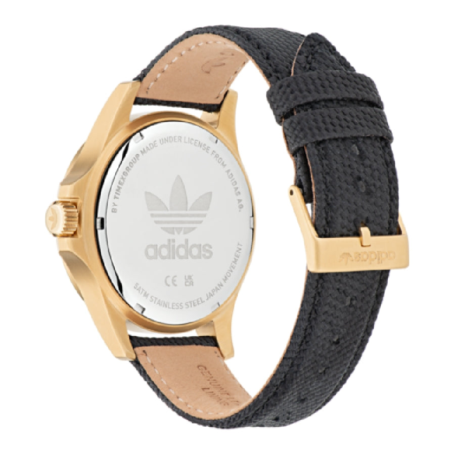  Reloj de lujo urbano Adidas Expression One AOFH23015 con caja de acero en tono dorado, esfera minimalista negra sin índices y correa de piel oscura. trasera